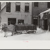 Rubbish and garbage is collected in the winter with sled. Woodstock, Vermont