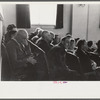 Townspeople listening to discussion during meeting, Woodstock, Vermont