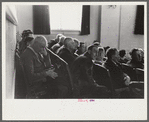 Townspeople listening to discussion during meeting, Woodstock, Vermont