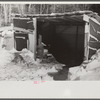 Lumbermen's shack where they can get warm, eat their lunch, and house the tractor with which they haul logs to the road where they are picked up and hauled to the mill by truck. Near Barnard, Windsor County, Vermont
