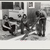 Skiers on porch of Mr. Dickinson's home in Lisbon, Franconia, New Hampshire. He installed a ski tow on his property three years ago costing around one thousand dollars, and this is the first year he has made any money on it,
