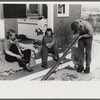 Skiers on porch of Mr. Dickinson's home in Lisbon, Franconia, New Hampshire. He installed a ski tow on his property three years ago costing around one thousand dollars, and this is the first year he has made any money on it,