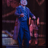 George Rose [close-up clutching book] in the stage production The Mystery of Edwin Drood