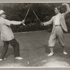 Postcard photograph of Yeichi Nimura fencing with unidentified man