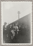 Hubert Carlin, Lisan Kay, Yeichi Nimura, and Virginia Lee at a train station in Warsaw, Poland