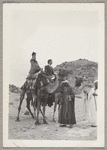 Lisan Kay and Yeichi Nimura riding camels in Egypt