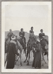 Hubert Carlin, Virginia Lee, Lisan Kay, and Yeichi Nimura riding camels in Egypt