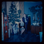 Lisan Kay and Yeichi Nimura with Christmas decorations, likely in their Carnegie Hall studio