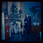 Lisan Kay and Yeichi Nimura with Christmas decorations, likely in their Carnegie Hall studio