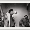 Baldwin, left, with brother David in stairwell