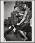 Baldwin dancing with Doris Castle, arm at chest level