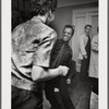 Baldwin dancing with Doris Castle, whose back is to the photographer