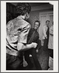 Baldwin dancing with Doris Castle, whose back is to the photographer
