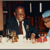 Baldwin seated with mother, Emma Berdis Jones Baldwin, at his 60th birthday celebration, UMass Campus Center