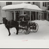 Woodstock, Vermont. Old-fashioned country peddler who goes from door to door selling hardware and groceries