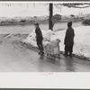 Berlin, New Hampshire. Children of paper mill workers bringing home groceries. The town is largely inhabited by French Canadians and Scandinavians