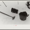 Lumbermen's tools and lunch box near Littleton, New Hampshire