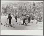 Skiers on the top of Cannon Mountain, Franconia Nottch, New Hampshire