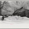 Young daughter of Frank H. Shurtleff going towards the sugar house where sap from sugar maple trees is boiled down into maple syrup. The Shurtleff farm has about 400 acres and was