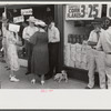 Farmers in front of store on Saturday afternoon in Cave City [actually Horse Cave], Kentucky