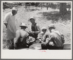 Parishoners peeling potatoes for a benefit picnic supper on the grounds of St. Thomas' Church. Near Bardstown, Kentucky