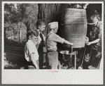 Children getting a drink of water at church picnic at St. Thomas Church, near Bardstown, Kentucky