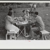 Legionnaires and their wives eating and drinking beer at American Legion fish fry, Oldham County, Post 39, near Louisville, Kentucky