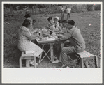 Legionnaires and their wives eating and drinking beer at American Legion fish fry, Oldham County, Post 39, near Louisville, Kentucky