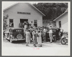 Mountain people leaving the Primitive Baptist Church in Morehead, Kentucky and going down to the creek for a baptizing