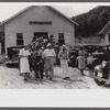 Mountain people leaving the Primitive Baptist Church in Morehead, Kentucky and going down to the creek for a baptizing