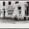Townspeople visiting while sitting in front of Old Talbott Tavern on Saturday afternoon. Bardstown, Kentucky