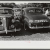 Cars parked in fairgrounds during county fair and horse show. Shelbyville, Kentucky