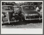 Cars parked in fairgrounds during county fair and horse show. Shelbyville, Kentucky