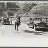 Relatives and friends of the family of the deceased going home from a memorial meeting in the mountains near Jackson, Kentucky. See general caption no. 1