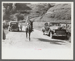 Relatives and friends of the family of the deceased going home from a memorial meeting in the mountains near Jackson, Kentucky. See general caption no. 1