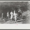 Relatives and friends of the family of the deceased going home from a memorial meeting in the mountains near Jackson, Kentucky. See general caption no. 1