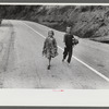 Mountain children going home along highway near Jackson, Breathitt County, Kentucky