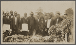 Photograph of funeral "Final earthly resting place of our friend, Bro. Bruce". Among those pictured are: Rev. Martin, Prof. W. W. Weeks, P. M. CE Cyril, Rev Wilson, Mrs. J. E. Bruce, A. Schomburg, and Marcus Garvey