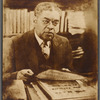 Portrait of Schomburg at his desk