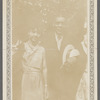 Photograph of Schomburg with young woman 