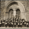 Arthur A. Schomburg and Harry A. Williamson (back row on right) in a group portrait with fellow members of the Prince Hall Grand Lodge, on the steps of Mother A.M.E. Zion Church, in Harlem, New York