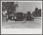 Buses which take many workers home in front of United Aircraft, Pratt and Whitney plant, East Hartford Connecticut