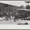 Workers leaving plant at afternoon change of shift, Pratt and Whitney, United Aircraft, East Hartford, Connecticut