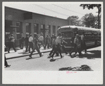 Workers leaving plant at afternoon change of shift, Pratt and Whitney, United Aircraft, East Hartford, Connecticut