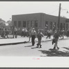 Workers leaving plant at afternoon change of shift, Pratt and Whitney, United Aircraft, East Hartford, Connecticut