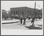 Workers leaving plant at afternoon change of shift, Pratt and Whitney, United Aircraft, East Hartford, Connecticut