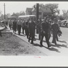 Workers entering plant at afternoon change of shift. Pratt and Whitney plant, United Aircraft, East Hartford, Connecticut