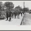 Workers entering plant at afternoon change of shift. Pratt and Whitney plant, United Aircraft, East Hartford, Connecticut