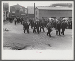 Workers leaving plant at change of shift before being paid off. Electric Boat Works, Groton, Connecticut