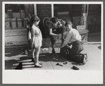 Children shining shoes on street corner, Hartford, Connecticut